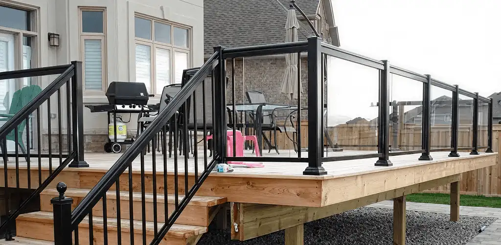Handrail installation on a deck staircase for safety and code compliance in El Paso, TX