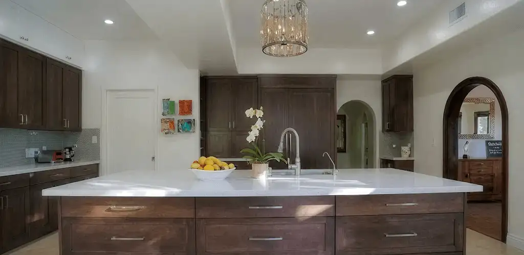 Cabinet refacing project with updated kitchen cabinets and island in El Paso, TX